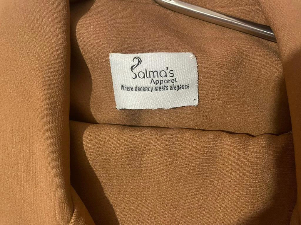 Women coat by Salma's Apparel